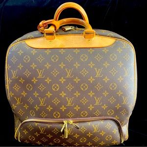 AUTHENTIC Louis Vuitton Evasion Travel Bag - preowned, gentle wear.